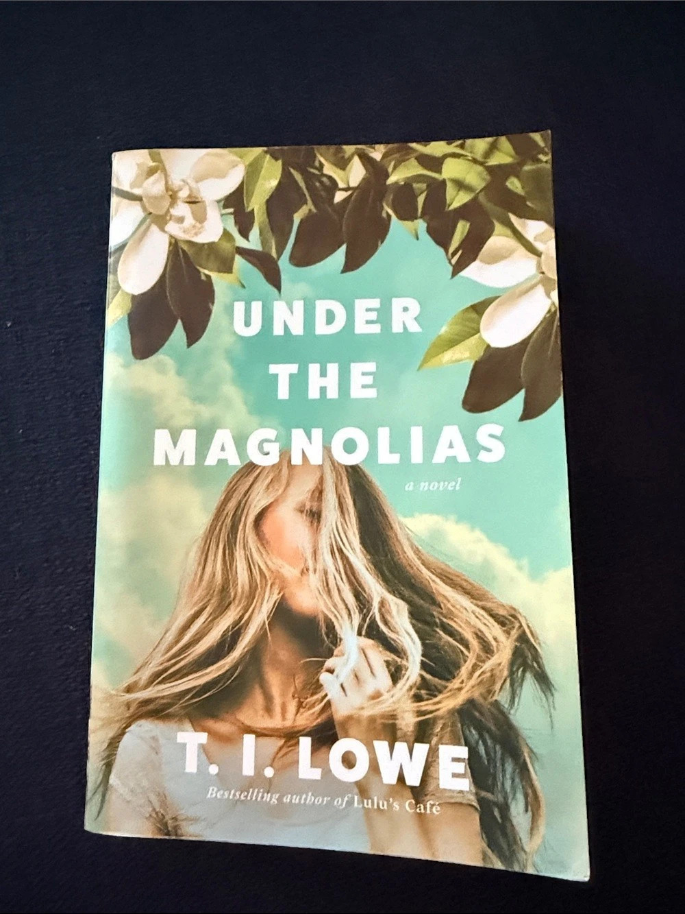 T.J. Lowe Under the Magnolias Novel Paperback Blue & Green Like New